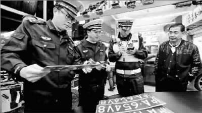 静安查处非法汽车改装店-城市建设和社会管理